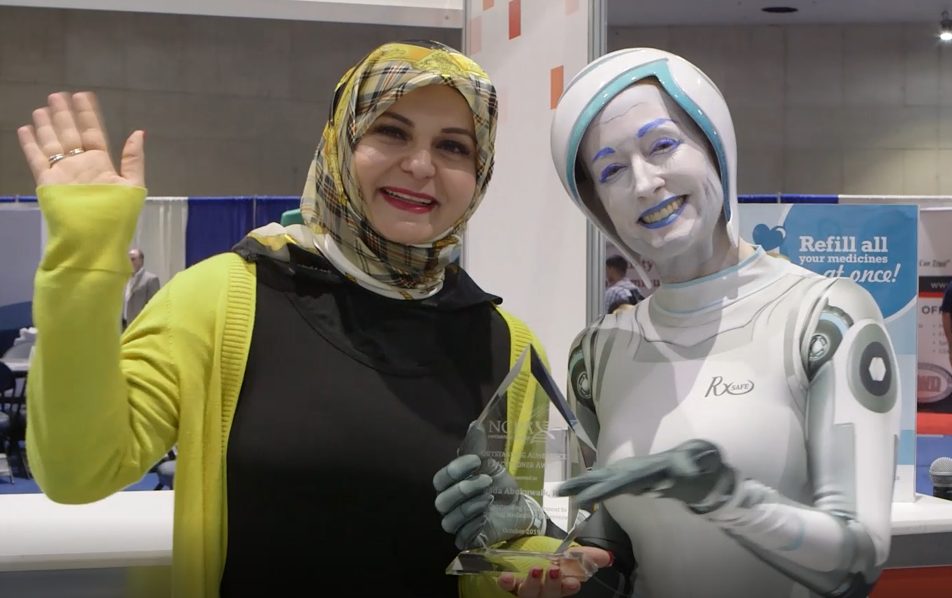 Ghada and Rxy the robot